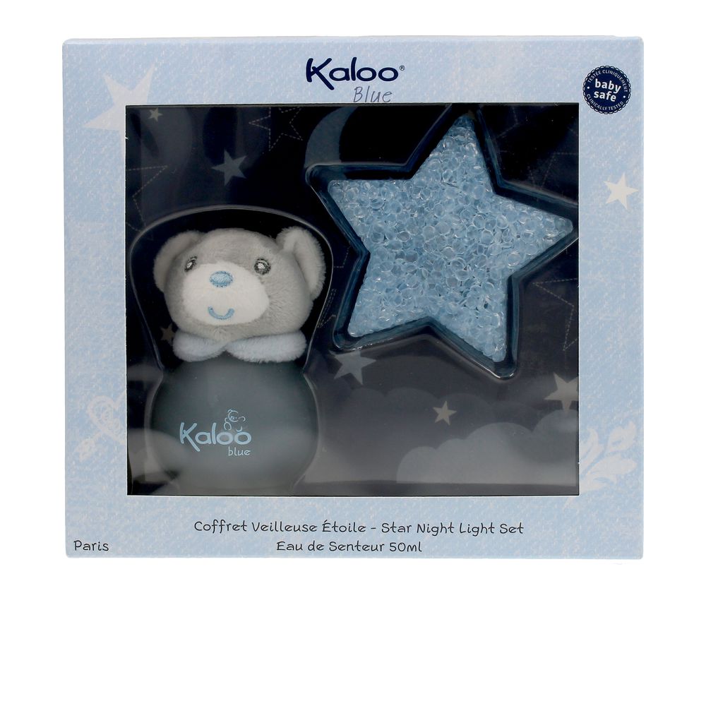 Gift set with rounded translucent perfume bottle and small plush bear, citrus-floral scent