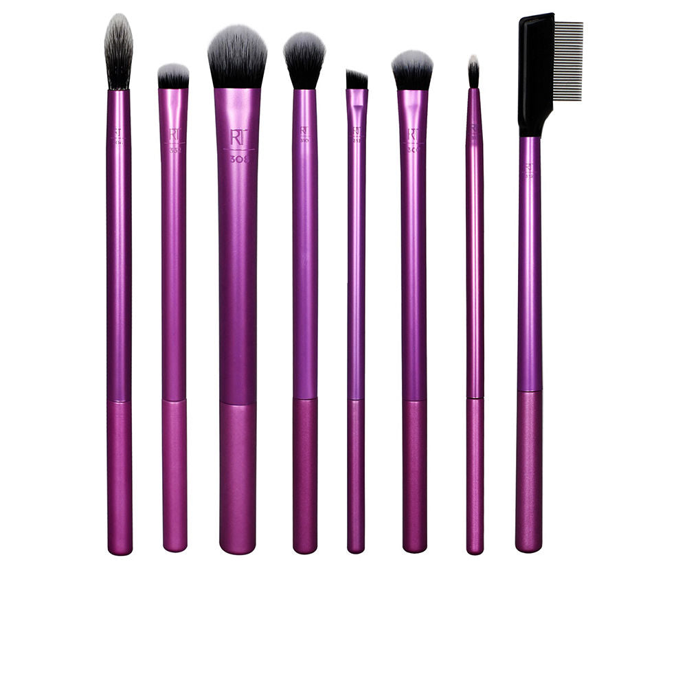 Real Techniques Eight-piece purple eye brush set with metal handles, varied synthetic shapes, black bristles with white tips