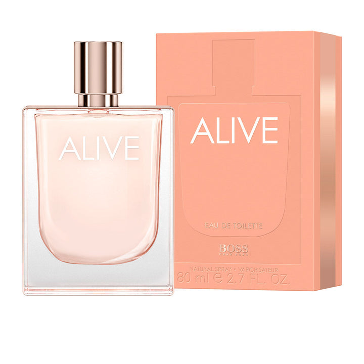 Clear crystal bottle of pale pink floral‑woody Eau de Toilette, 80 ml, rose‑gold detail