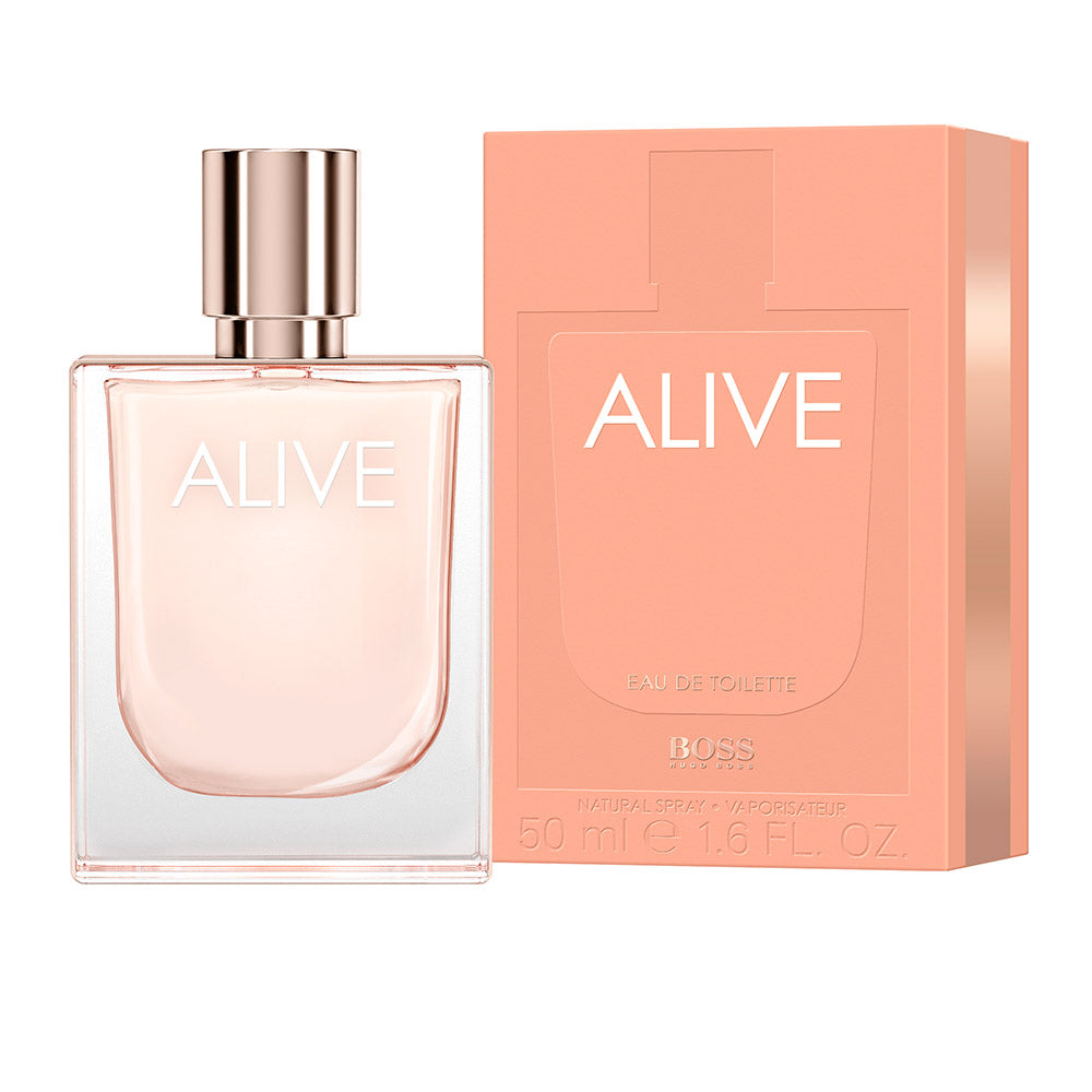 Clear crystal bottle of pale pink floral‑woody Eau de Toilette, 80 ml, rose‑gold detail