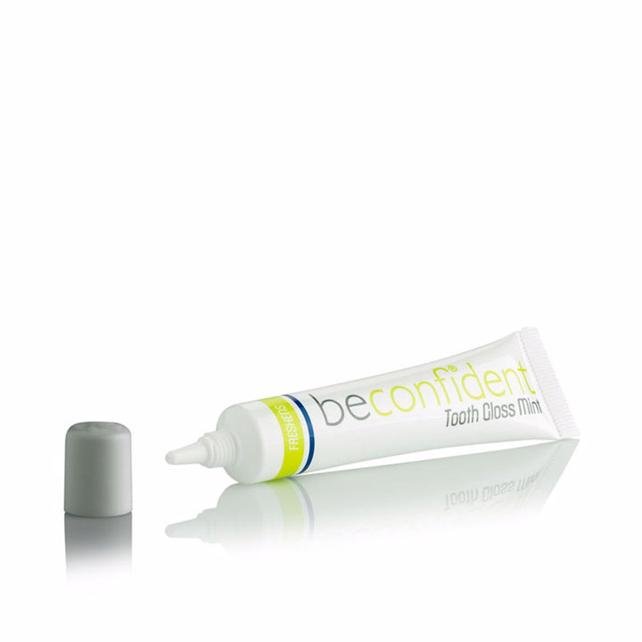 Small 10 ml mint tooth gloss tube with fine applicator, sheer glossy finish