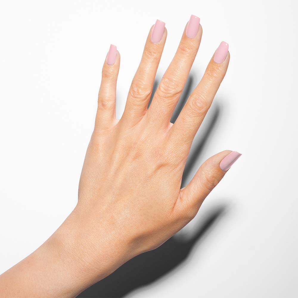 15 ml clear glass bottle of cream pink nail lacquer with curved brush