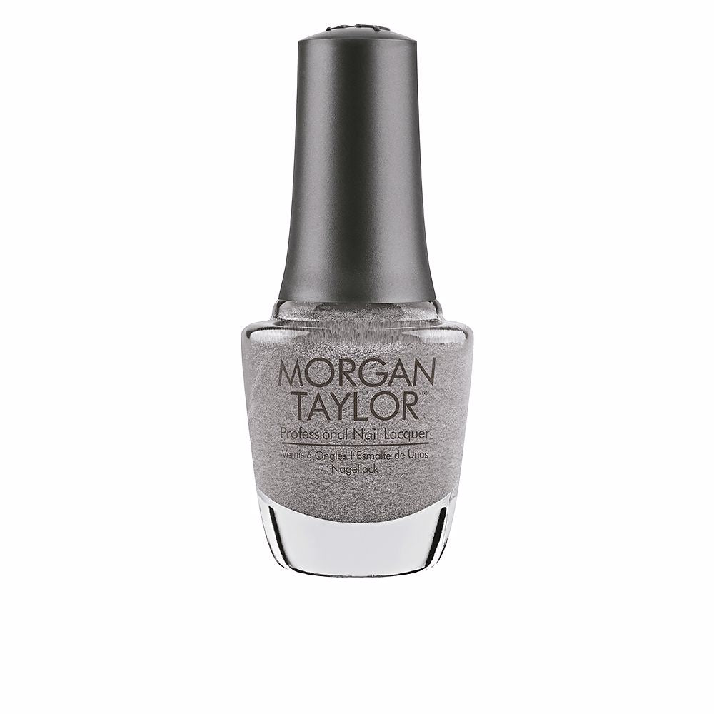 Clear glass bottle of creamy red nail lacquer with ergonomic cap, 15 ml
