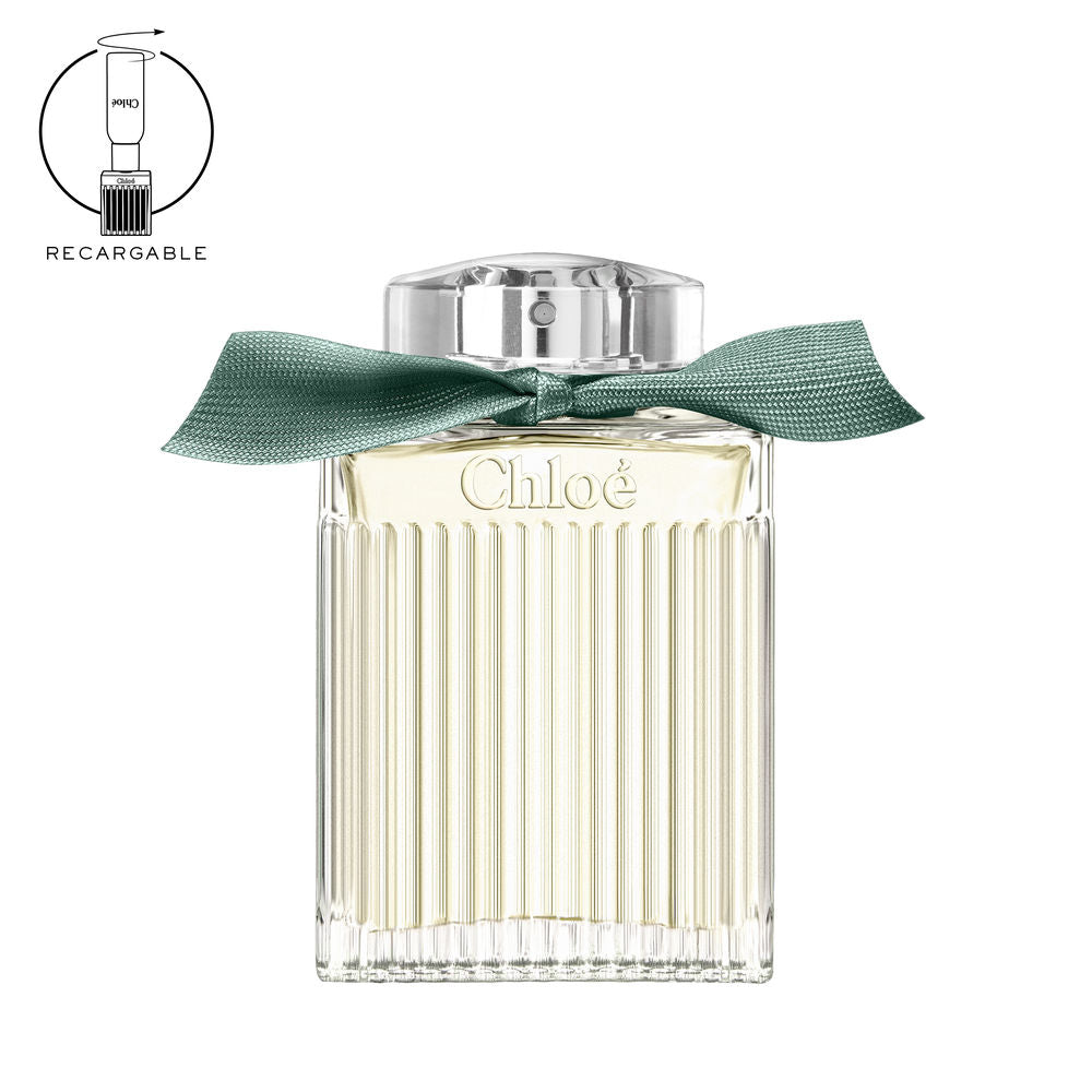 100 ml glass perfume bottle with recycled ribbon, green accent, woody-floral fragrance