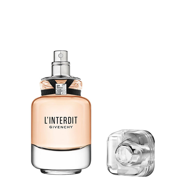35 ml glass bottle Eau de Toilette with black ribbon and emblem