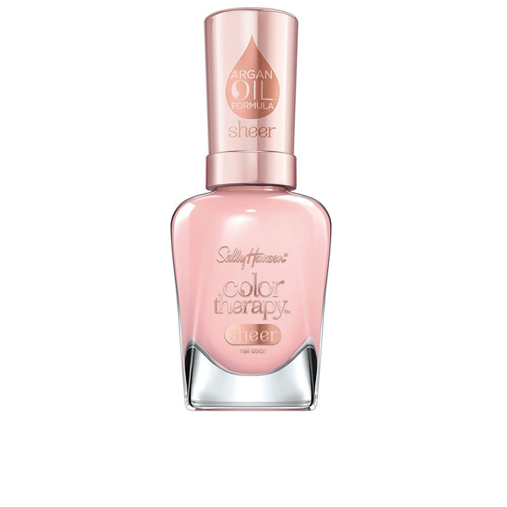 Bottle of sheer rosy quartz nail polish, glossy rosy translucent shade, 14.7 ml
