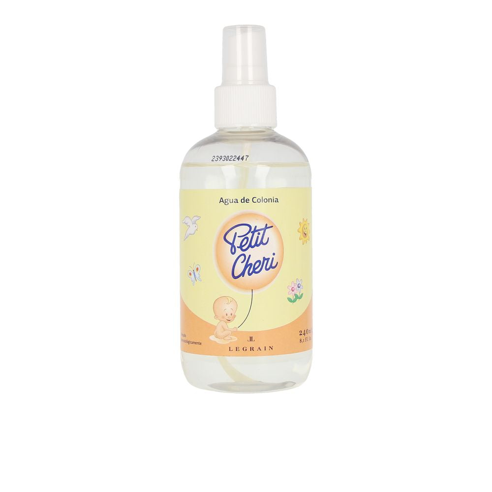 Clear plastic cologne spray with yellow-orange round label, baby illustration, butterfly, and spray nozzle, Legrain