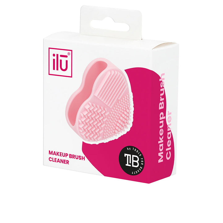 Pink silicone brush cleaner pad with varied surface textures for makeup brushes