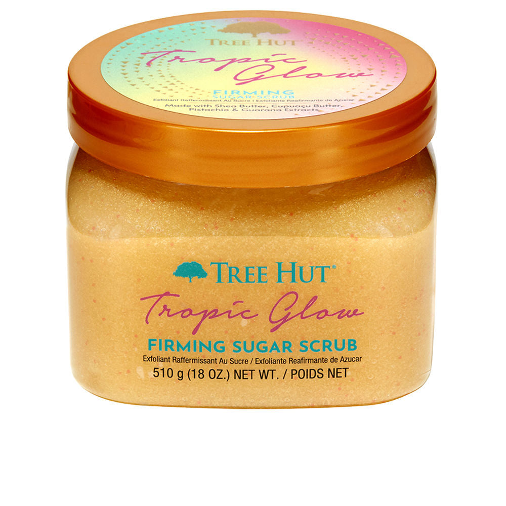 Jar of tropical sugar body scrub with creamy butter texture and visible oil.