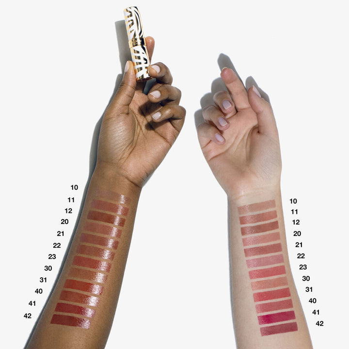 Refillable glossy lip colour stick in sheer peony, 3 g, striped jewel case