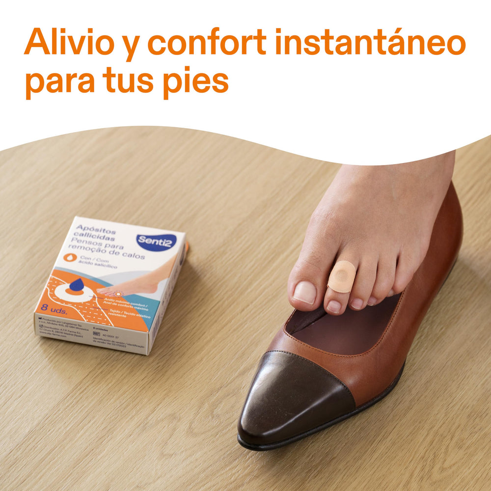 Senti2 rectangular white, orange, and blue box of corn removal pads showing foot illustration, drop icon, multilingual text, and top cut-out handle.