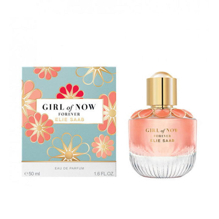 50 ml clear perfume bottle with coral floral motif beside matching box