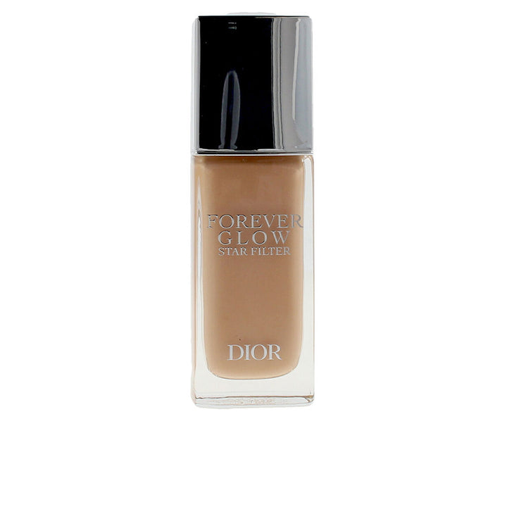 Small pump bottle of lightweight illuminating fluid, pearlescent finish, shade 3N