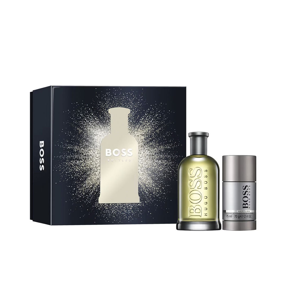 Fragrance gift set with eau de toilette and toiletry in pared‑back gift case, woody‑fruity scent