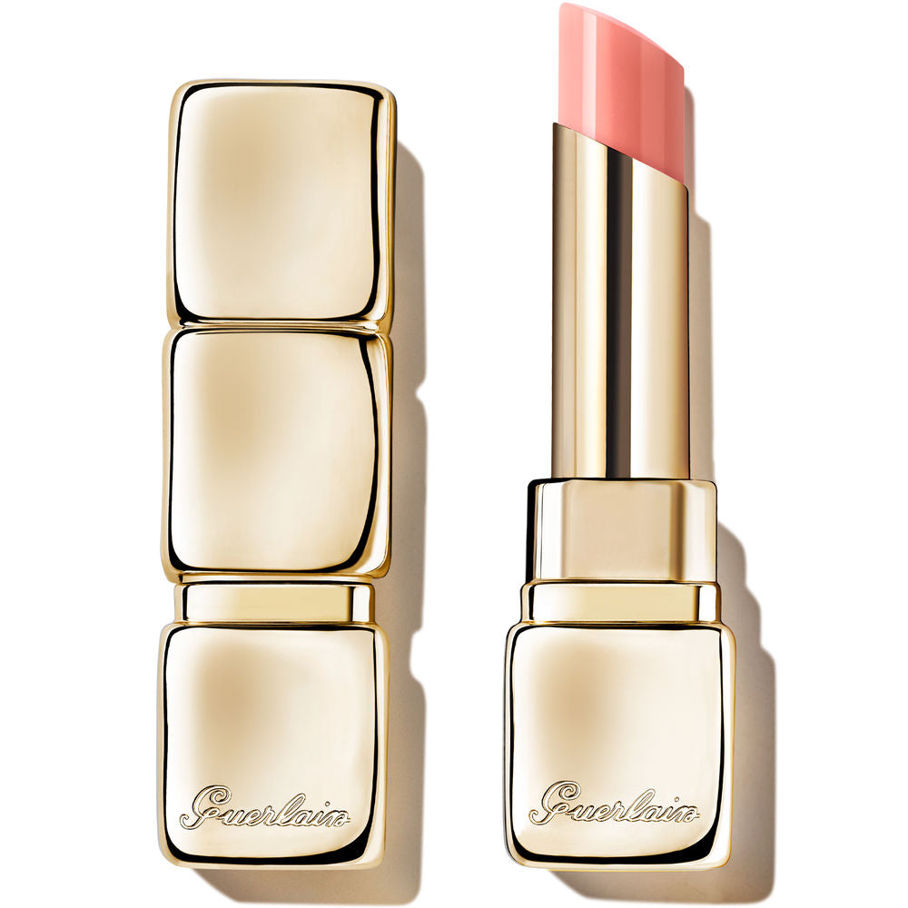Guerlain Compact metallic gold and pink rectangular lip balm with glossy, smooth finish and rounded bullet tip