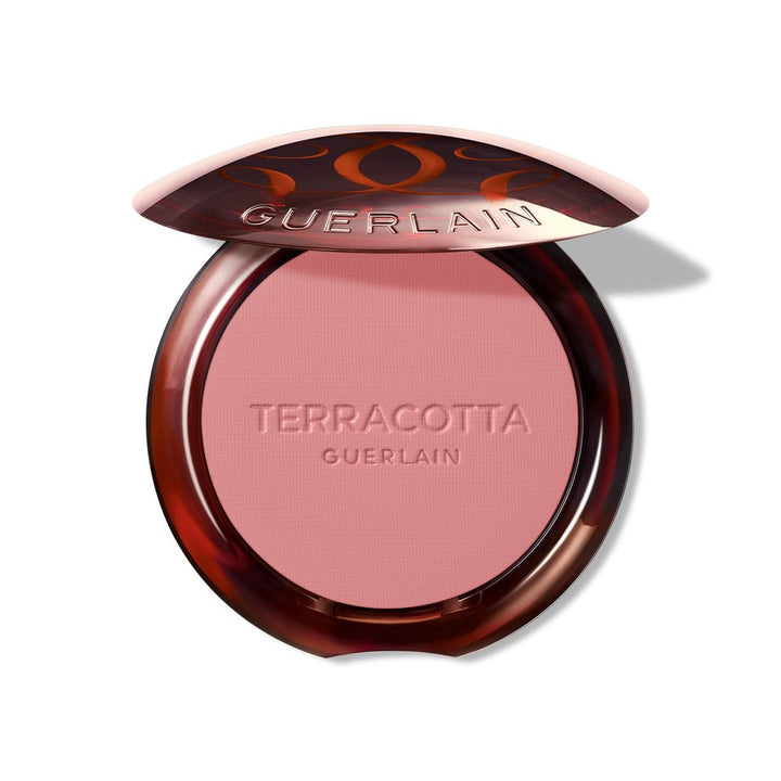 Mini terracotta powder blush compact in soft pink shade, matte finish
