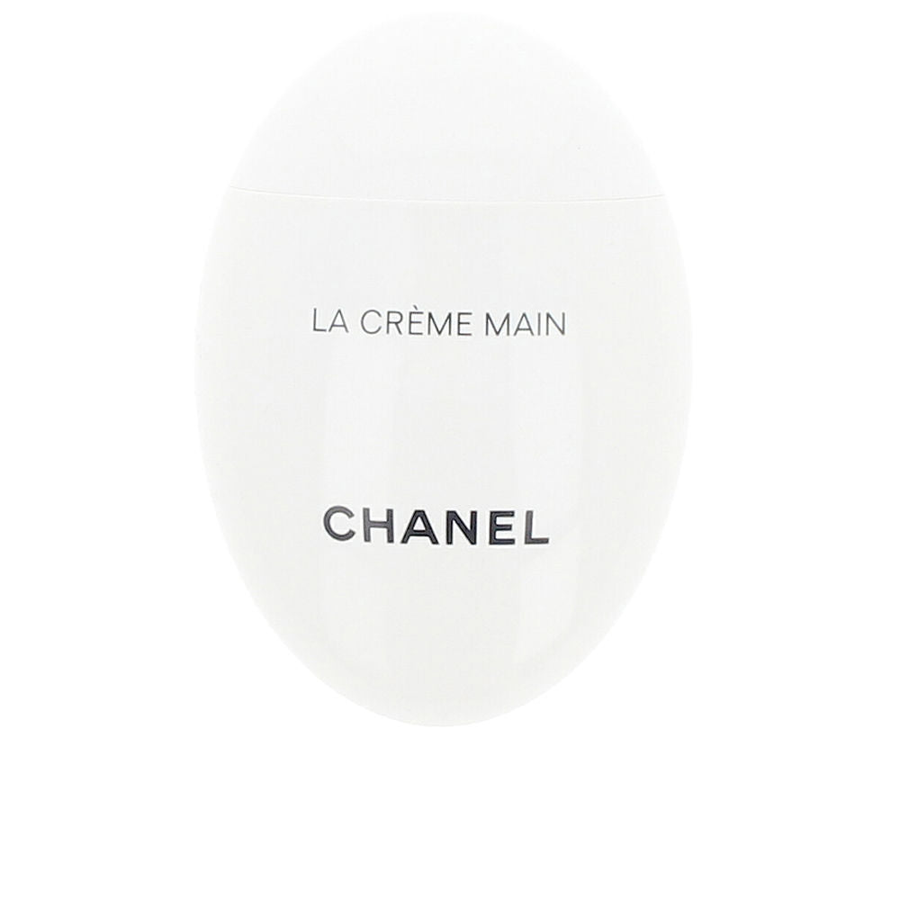 Chanel White oval hand cream tube, compact minimalist design with smooth surface and black text branding