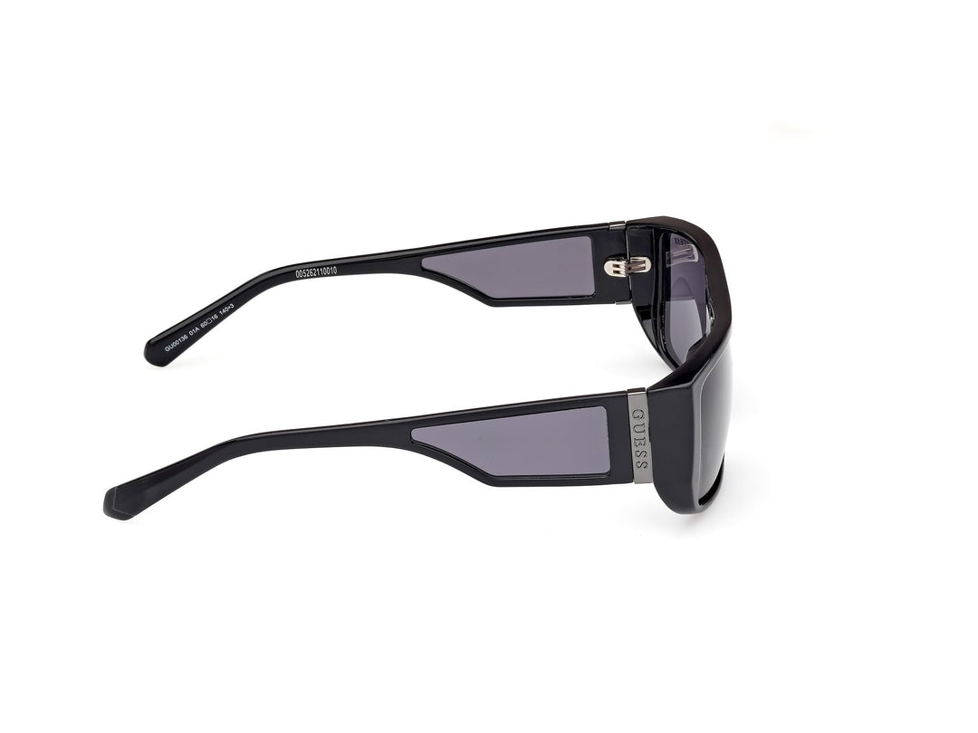 Guess rectangular black plastic sunglasses with thick frame, dark tinted lenses, straight temples, lens logo
