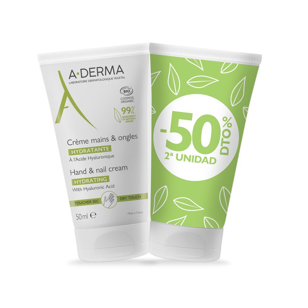 Tube of A-DERMA Hand & Nail Cream beside hands and oat sprig on neutral background