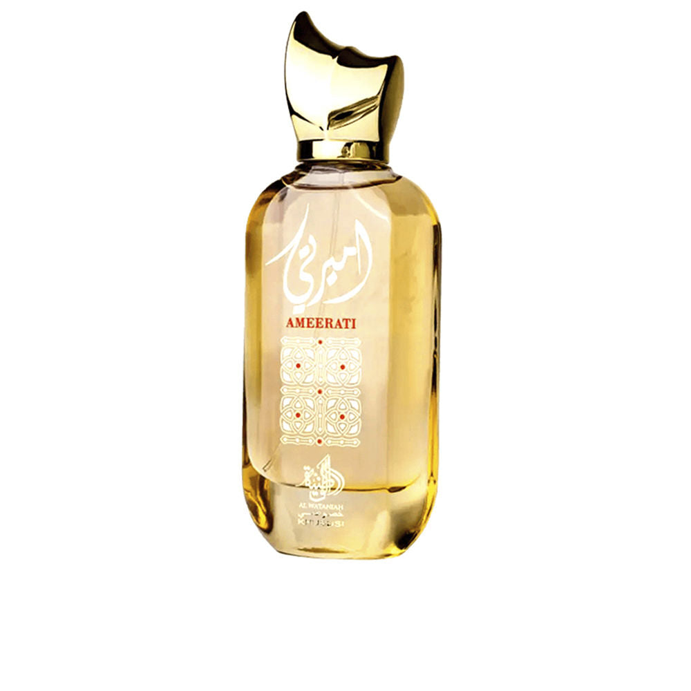 Al Wataniah perfume bottle with transparent glass, curved golden cap, Arabic script and geometric pattern