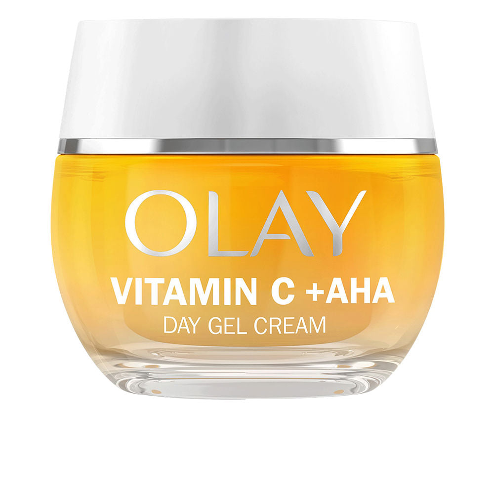 Olay Transparent plastic jar of yellow face cream with white lid, silver band, printed text, rounded shape