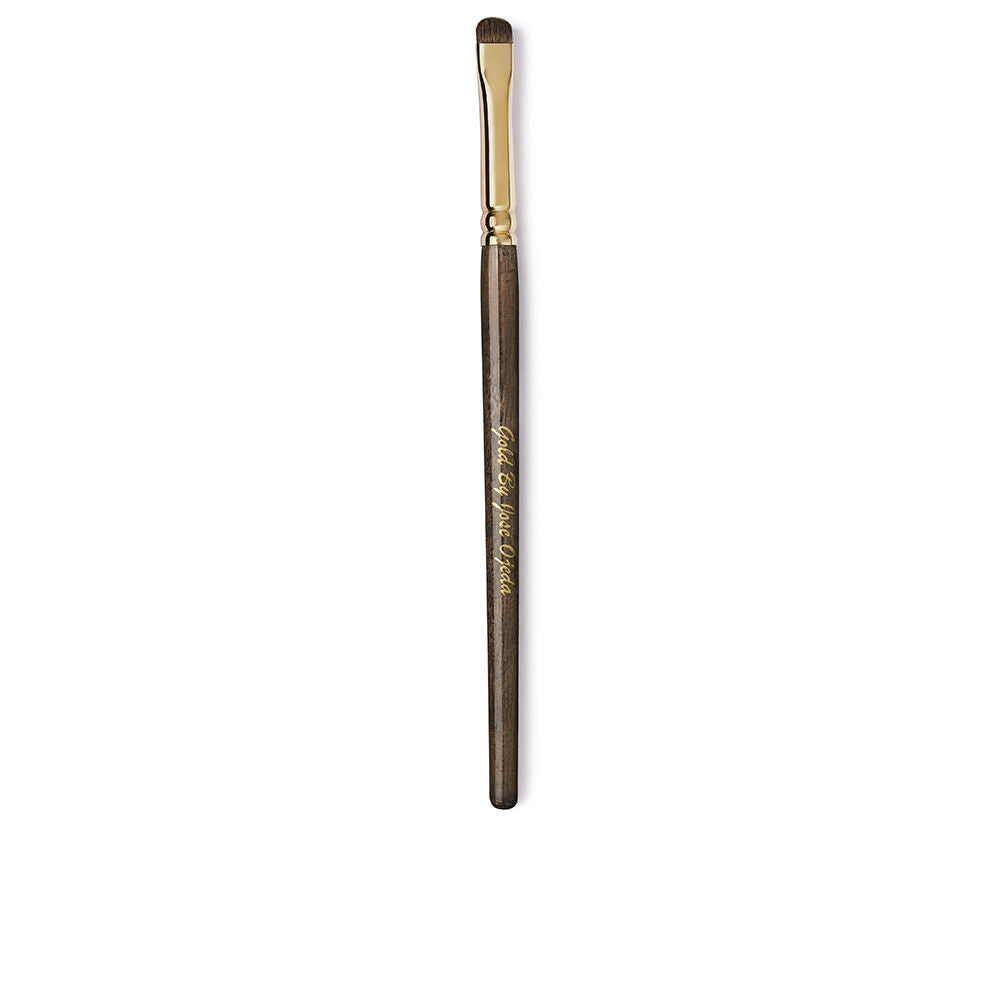 Gold By Jose Ojeda Small flat eyeshadow brush with wooden handle, gold ferrule, brown fibers, printed text on handle