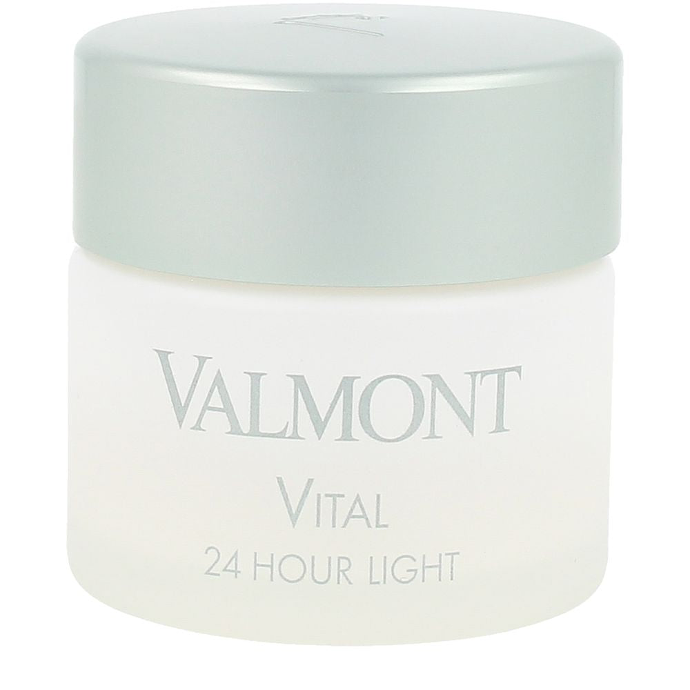 Valmont White and silver cylindrical plastic face cream jar with screw-on lid, minimalist printed brand and product text