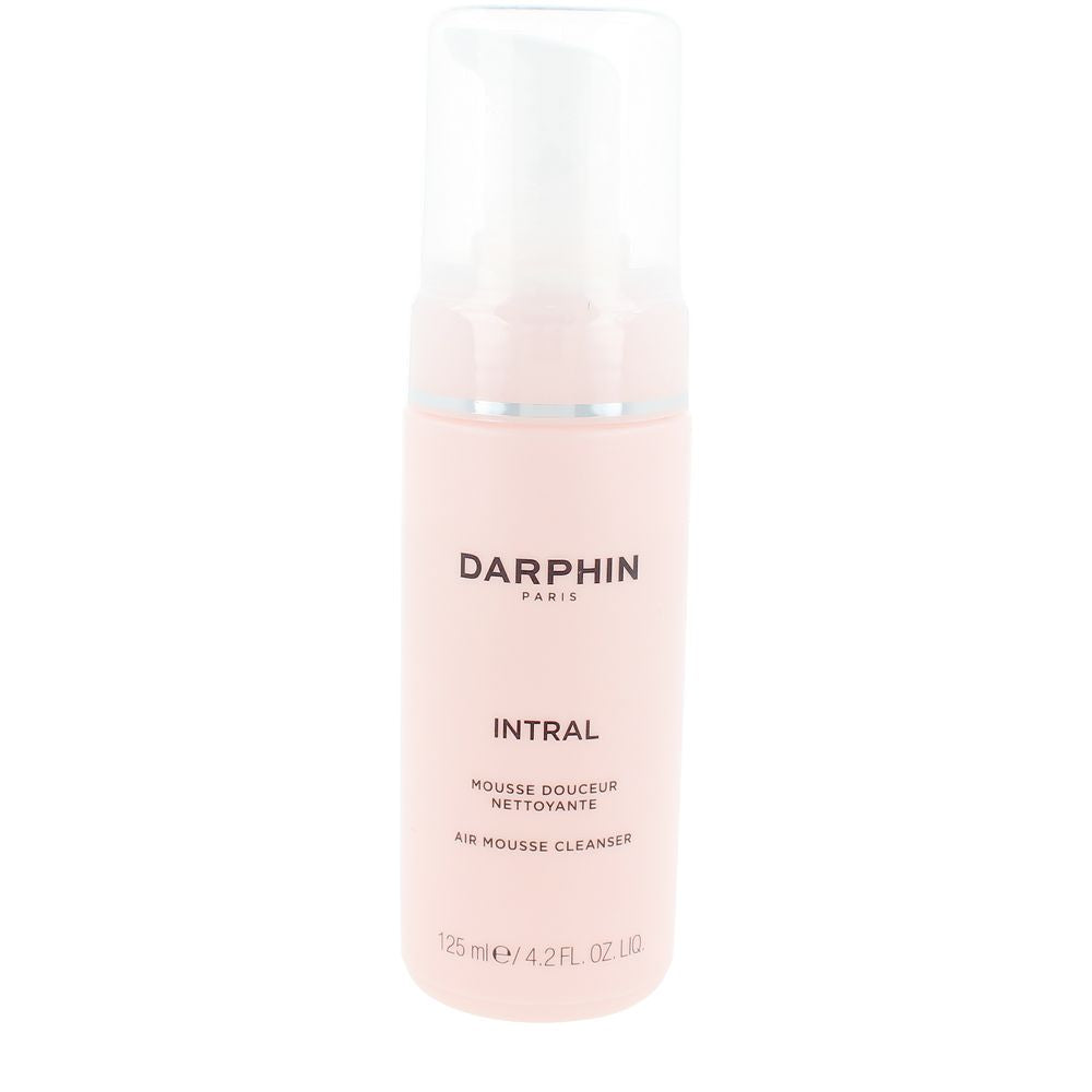 Darphin chamomile cleansing mousse in a foamy texture on a neutral backdrop
