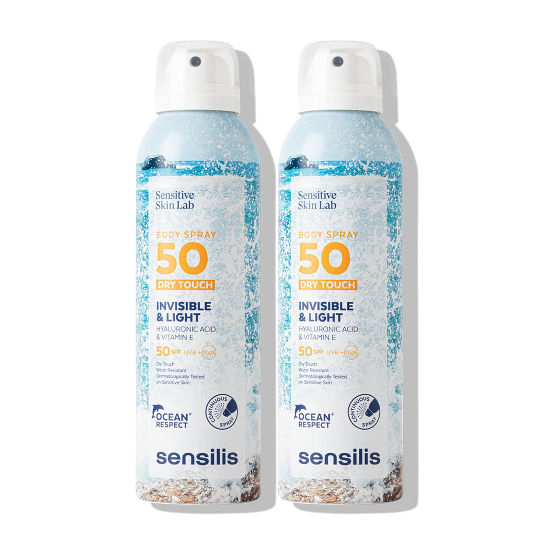 Spray bottle of SPF50+ body sunscreen with sleek cylindrical white bottle and clear cap, Sensilis