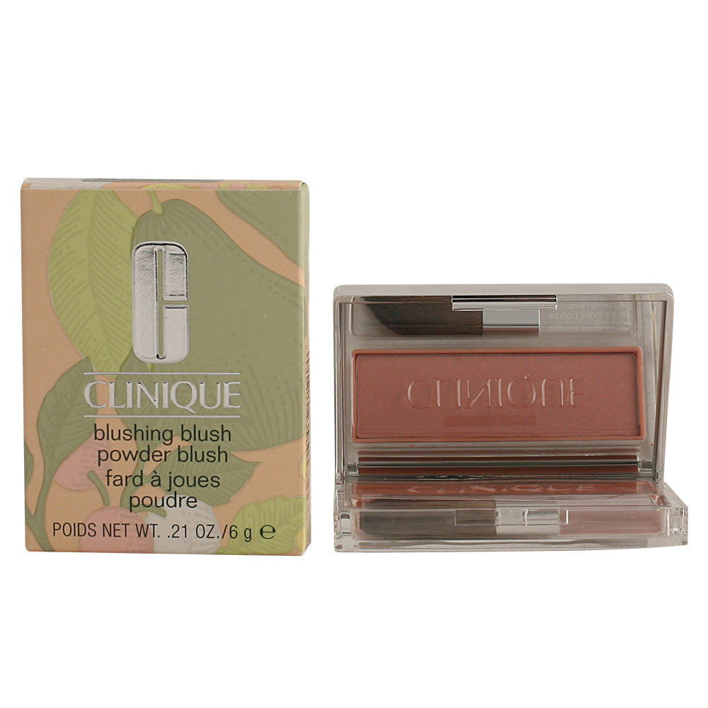 Compact pressed powder blush in Innocent Peach with angled applicator brush