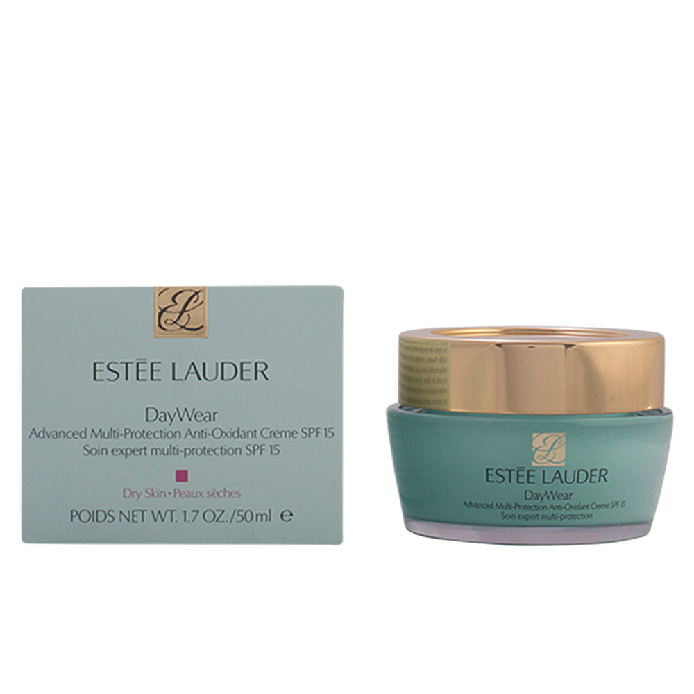 Estée Lauder Teal face cream jar with gold lid and printed logo beside matching box, plastic jar and lid
