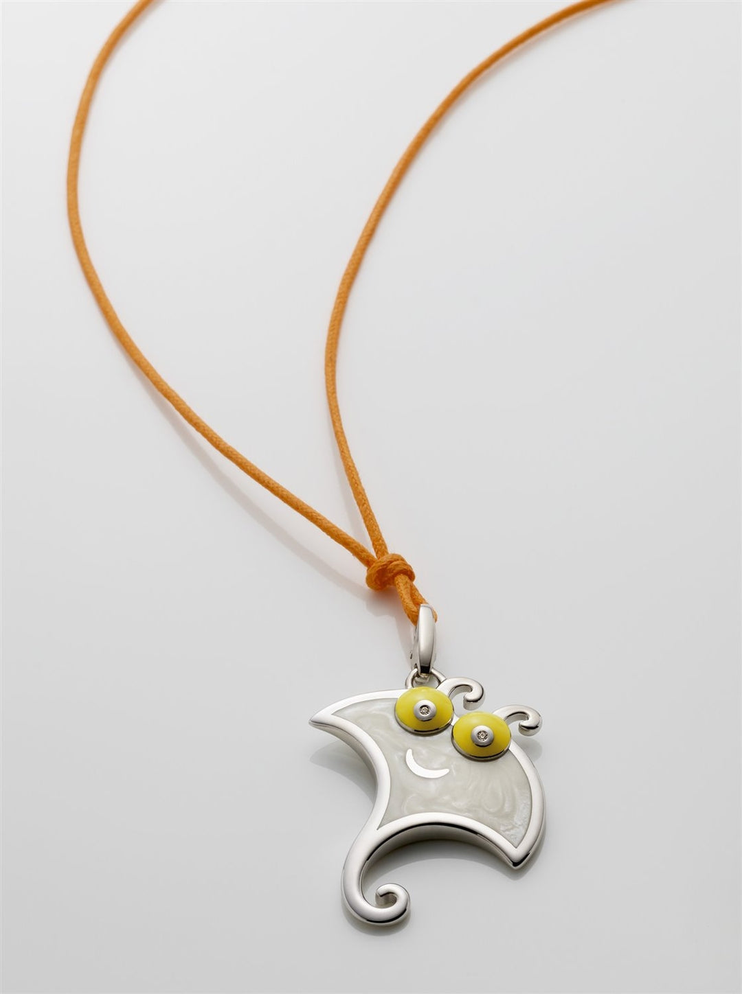 Vibrant Enamel Pendant with Fabric Cord Accent