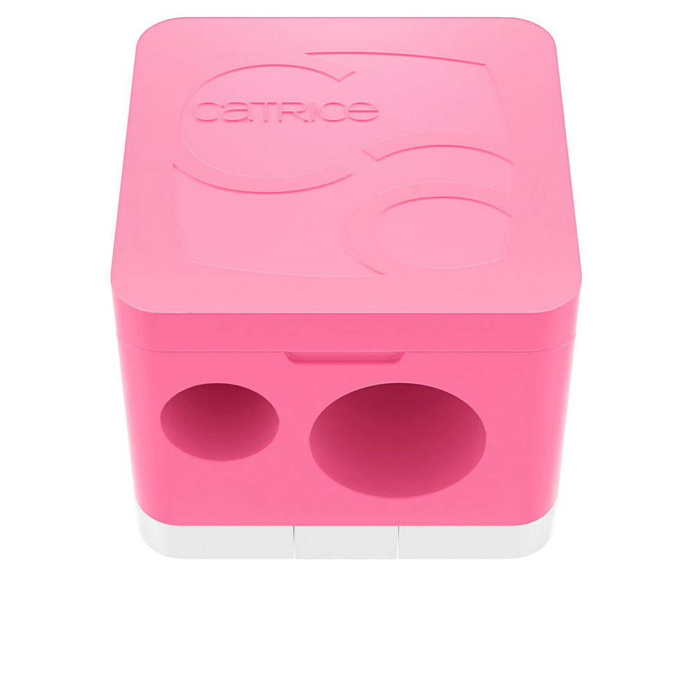 Catrice Pink and white plastic double pencil sharpener with two circular holes and embossed logo