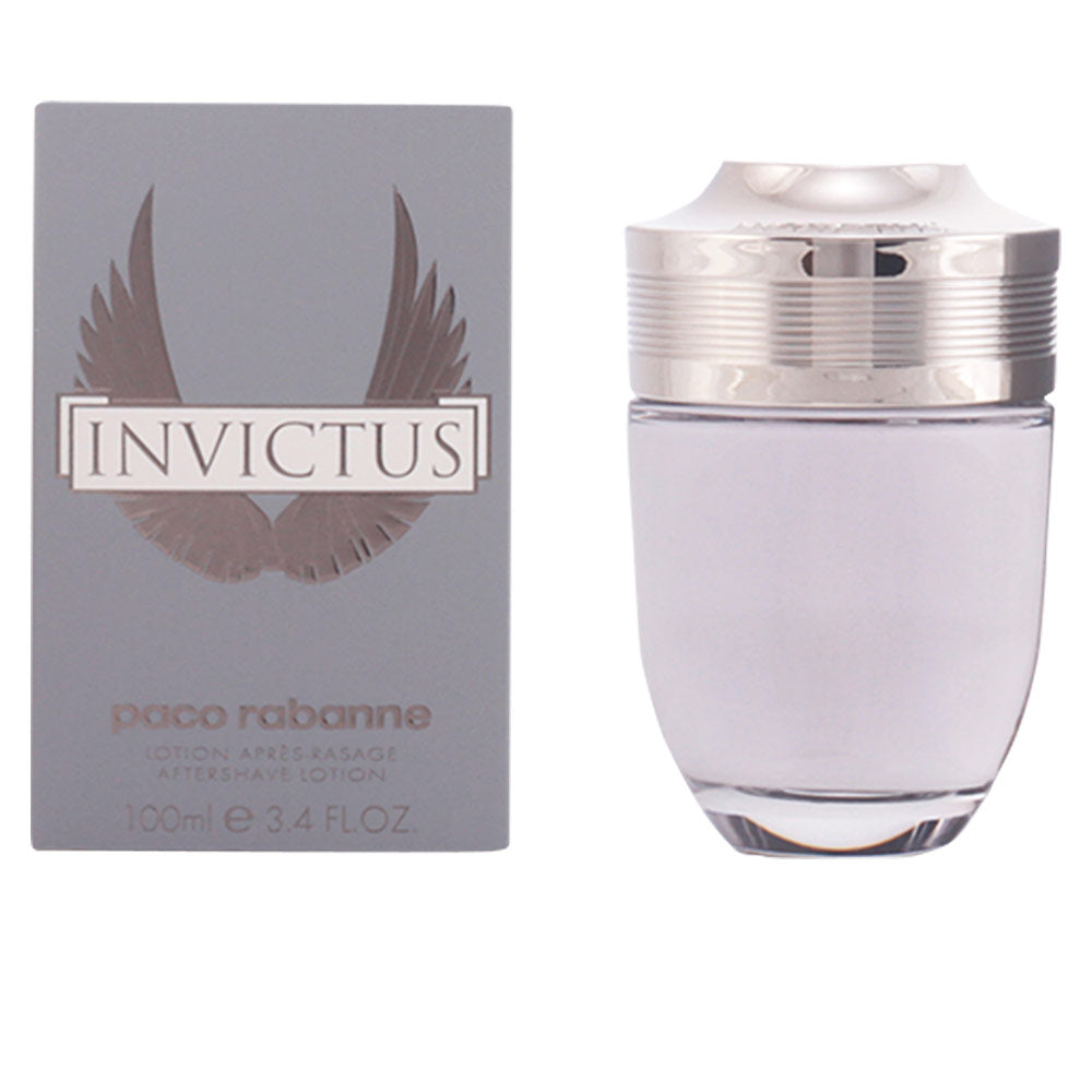 Rabanne Glass aftershave bottle with transparent body, silver metallic cap, wing logo and engraved lines