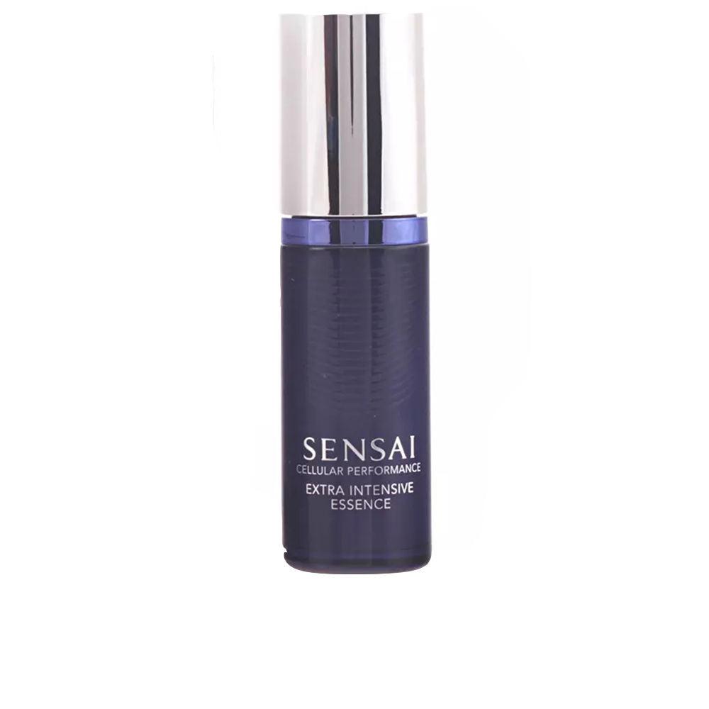 Dark blue cylindrical essence bottle with shiny silver cap, minimalist modern design, Sensai brand visible