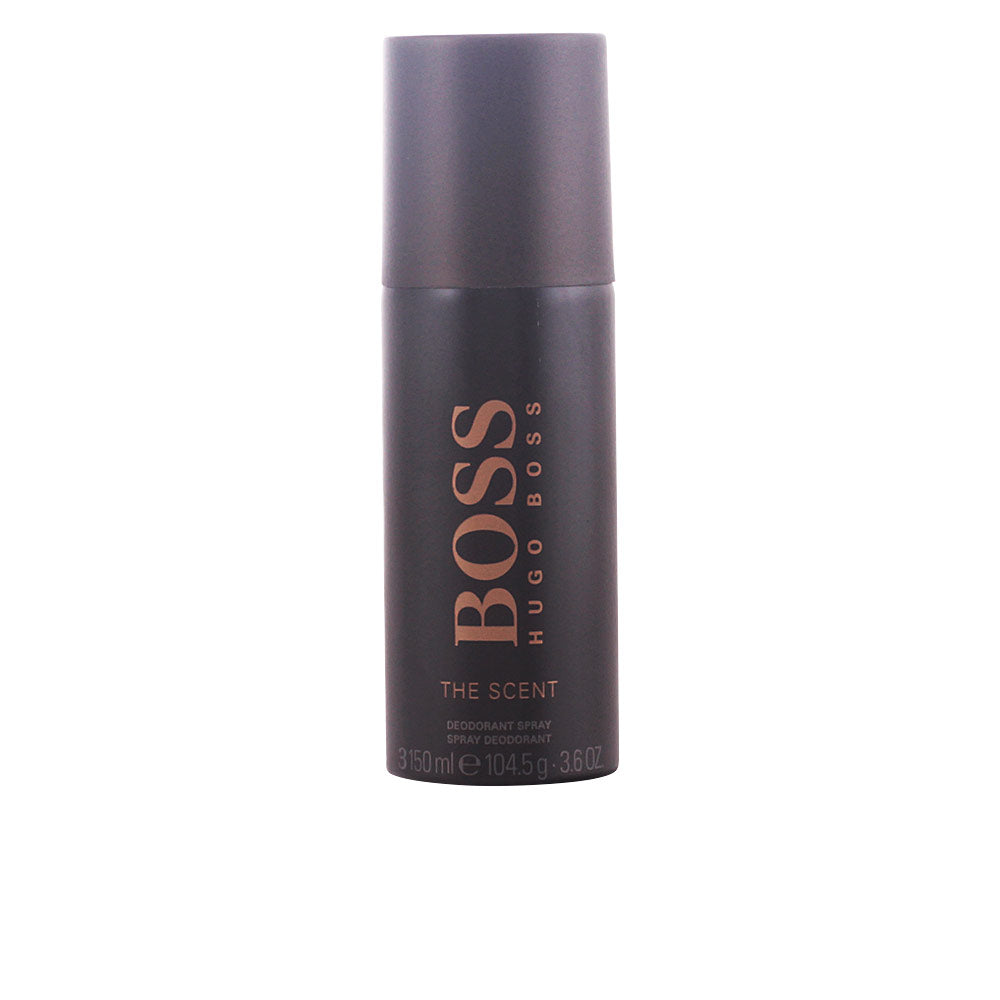A sleek Hugo Boss THE SCENT deodorant spray can in masculine design