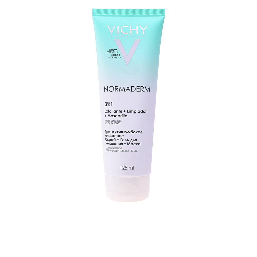 Tube of gradient light blue-to-white plastic facial cleanser with flip-top cap, printed text and logo — Vichy