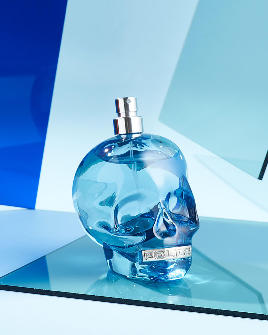 Blue clear glass skull-shaped 75 ml eau de toilette spray for Man