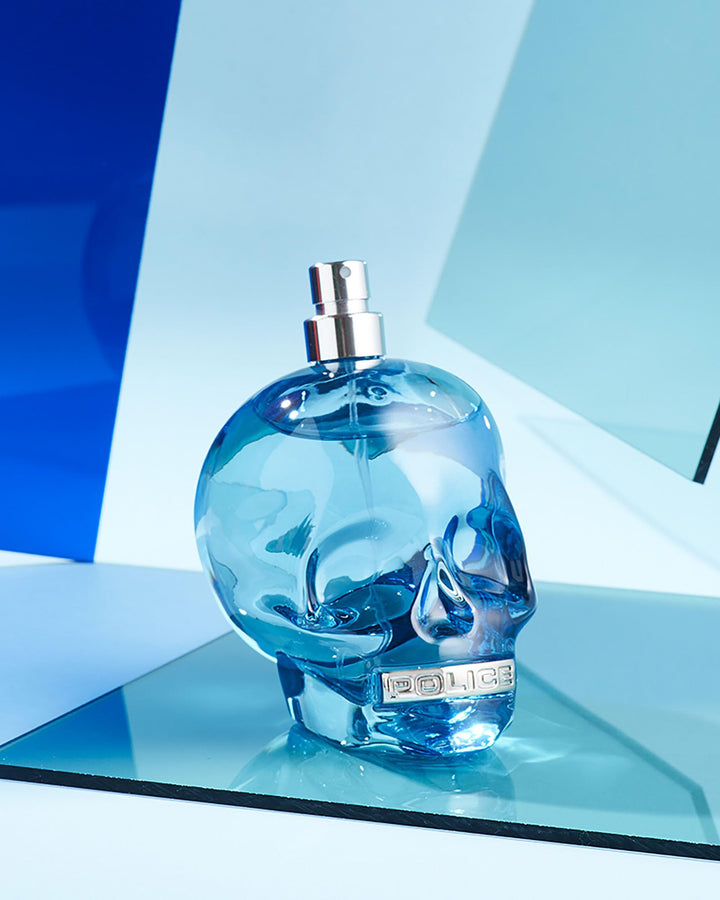 Blue clear glass skull-shaped 75 ml eau de toilette spray for Man