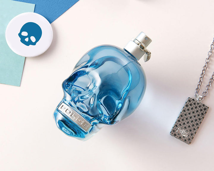 Blue clear glass skull-shaped 75 ml eau de toilette spray for Man
