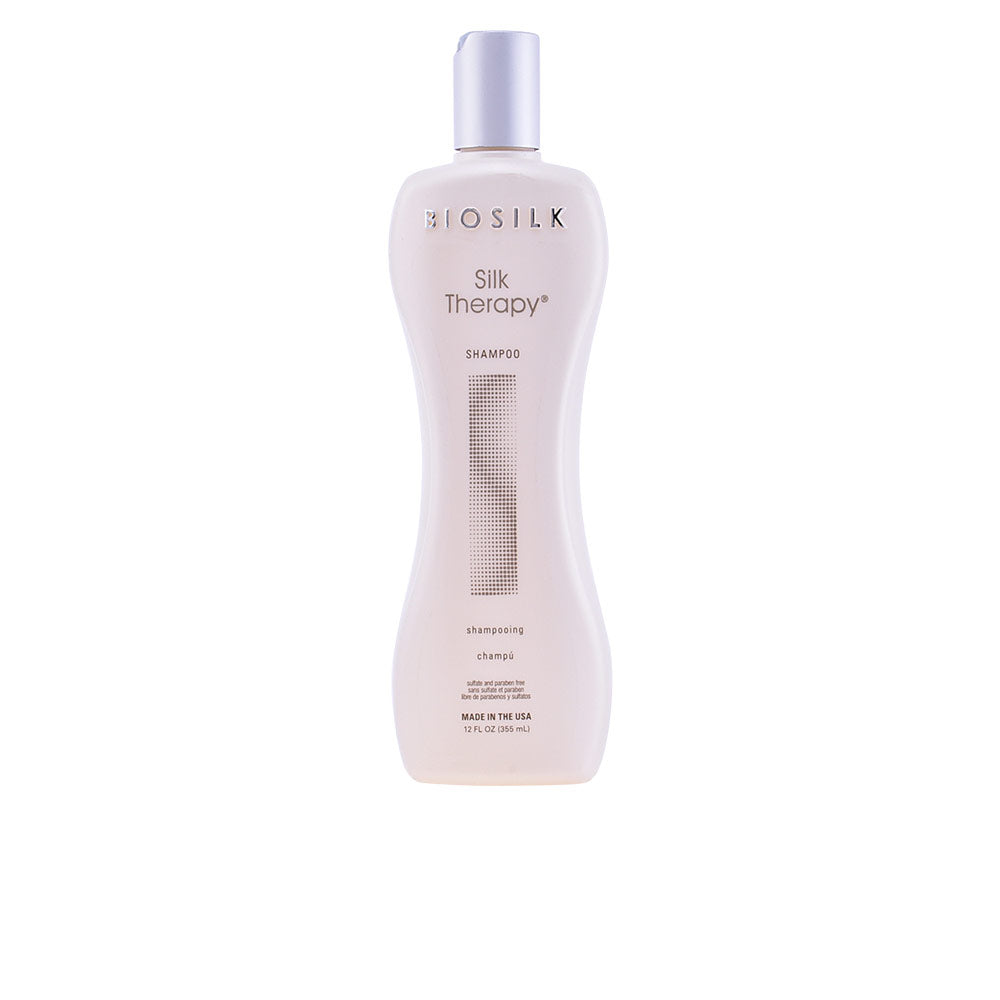 355 ml translucent shampoo bottle labelled Silk Therapy, herbal blend, Unisex