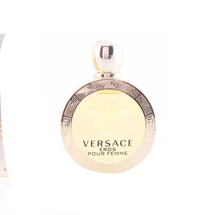 Spherical golden 30 ml eau de toilette bottle with Medusa motif, floral-woody fragrance