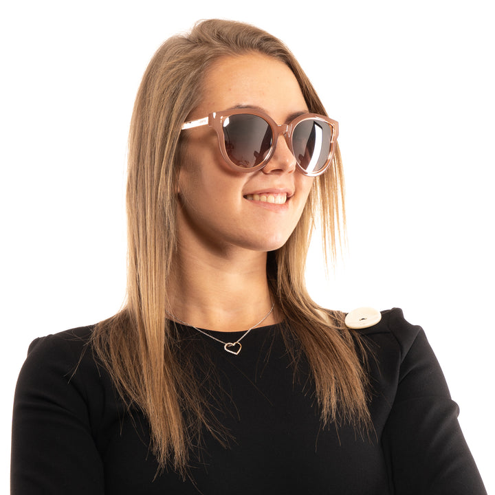 Brown and beige thick plastic round sunglasses with silver mirrored lenses on white background