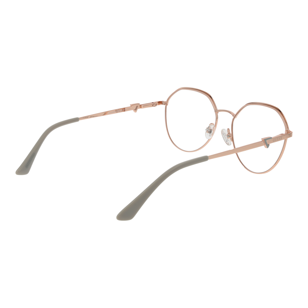 Rose gold thin metal round eyeglasses on beige background, adjustable nose pads, modern minimalist frame