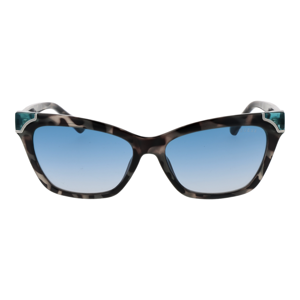 Guess tortoise cat-eye sunglasses with blue gradient lenses and teal corner accents on a neutral background