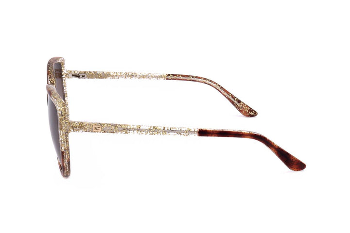 Brown and gold glitter cat-eye sunglasses with gradient lenses on white background, fashionable Women’s accessory