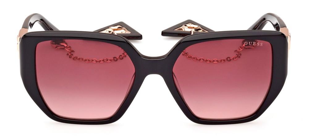 Black oversized square sunglasses with pink gradient lenses, rose gold accents and chain-detail temples