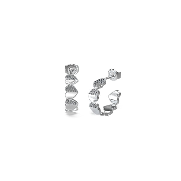 Silver hoop earrings featuring heart-shaped links set with small crystals against white background
