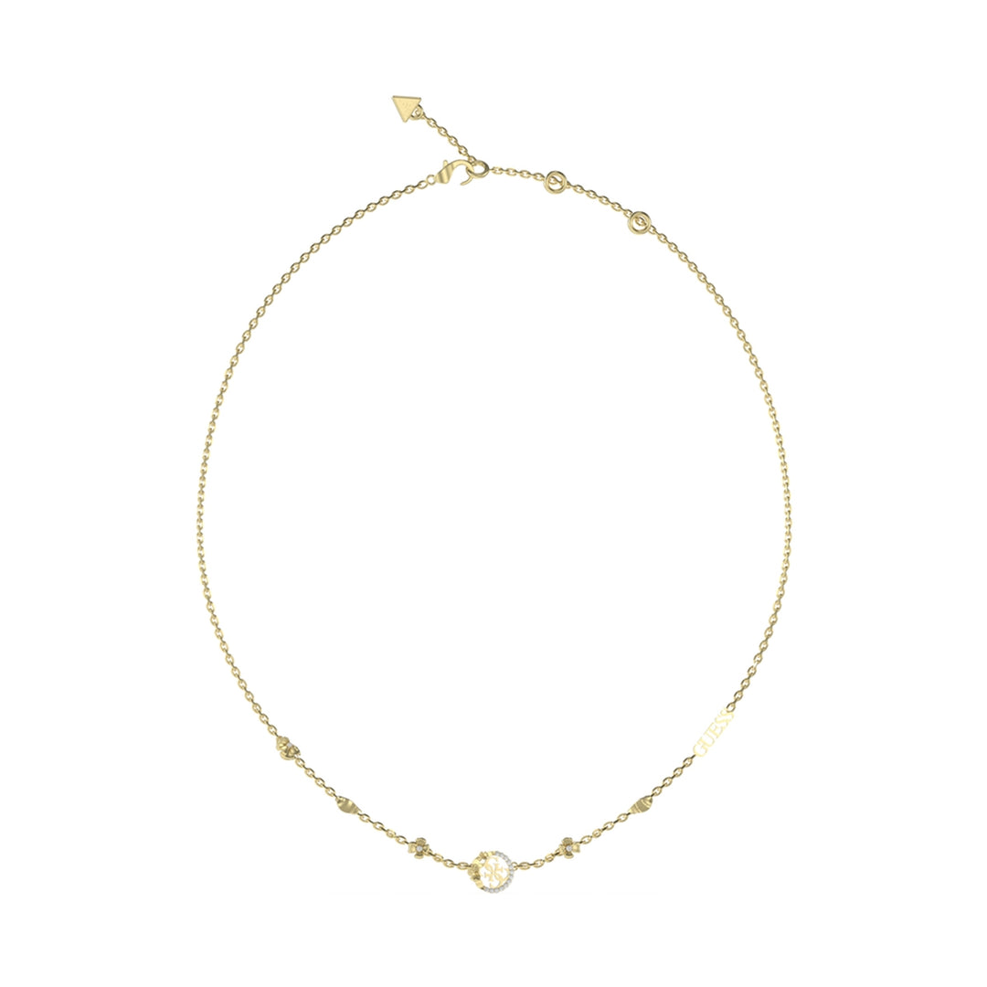 Delicate gold chain necklace with circular pendant set with small stones against neutral background