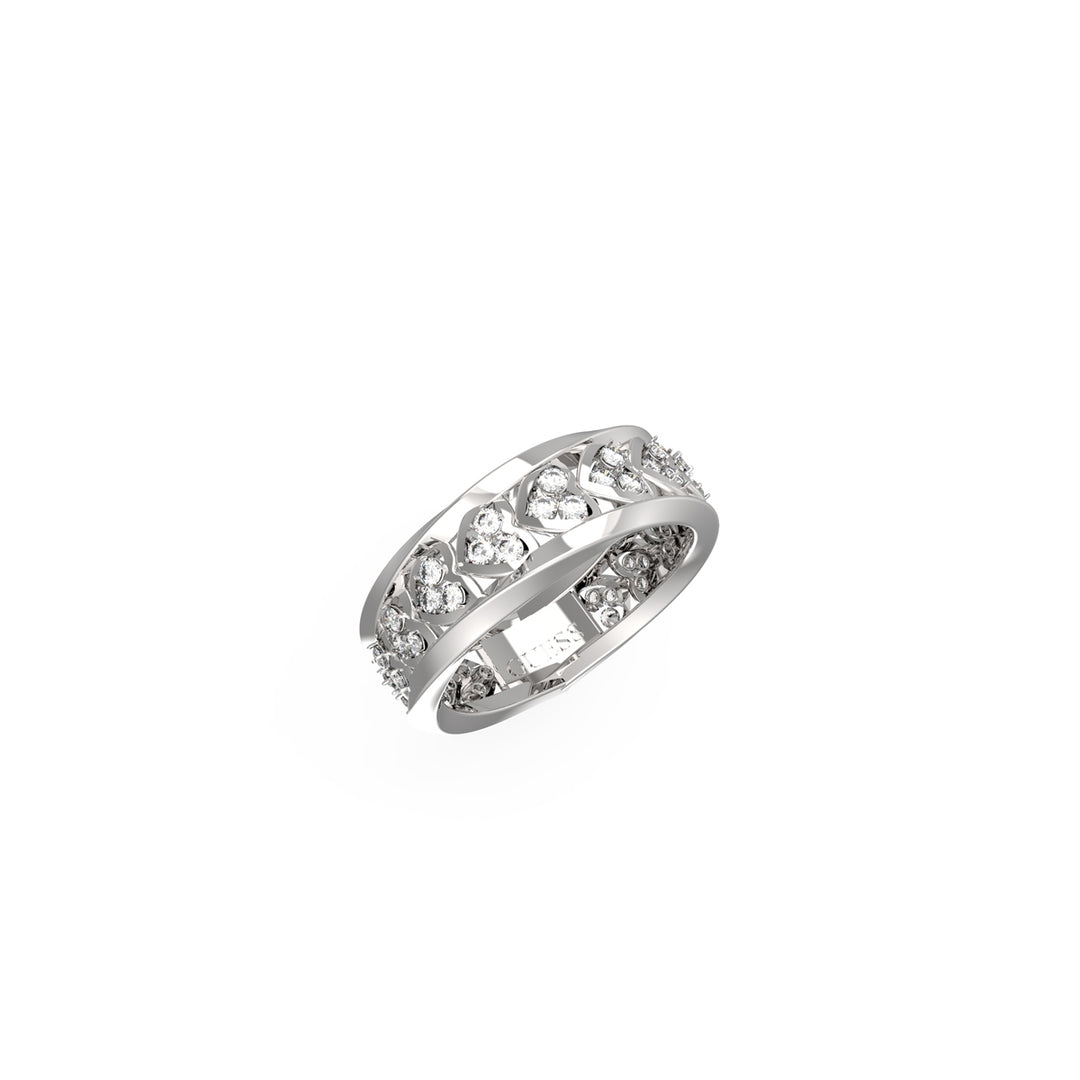 Silver decorative ring featuring heart shapes and embedded sparkling stones on polished band